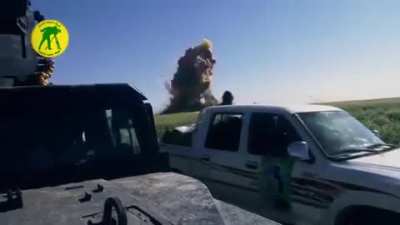 Guy almost hit by a shrapnel after a car exploded in Iraq
