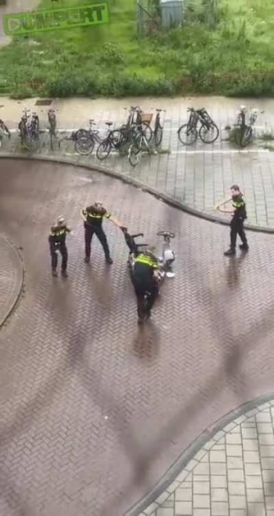 Old man on scooter in the Netherlands gets tased and arrested by 4 cops.