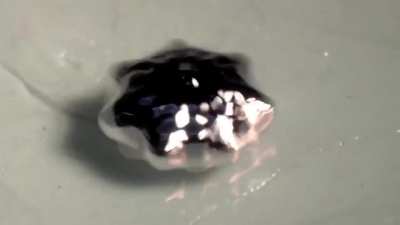 A drop of mercury being vibrated from ~120Hz down to ~10hz