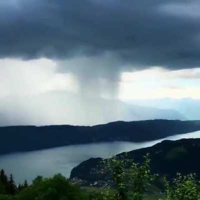 ? A cloudburst over Lake Millstatt, Austria captured by photographer Peter Maier.