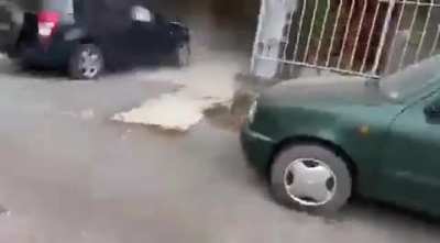 A drunk driver hits multiple vehicles in an apartment block, slams into garage door. Later, in front of reporters, he claims to have only drank "a glass of wine"