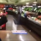 Laying on vegetables at the supermarket