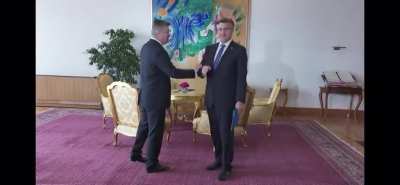 The awkward “handshake”