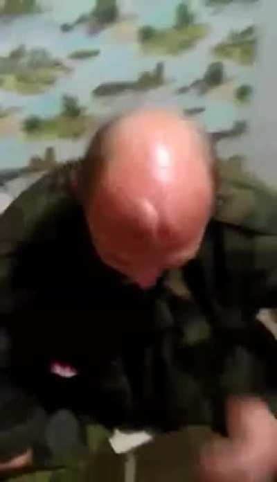 Trying to break a bottle with your head