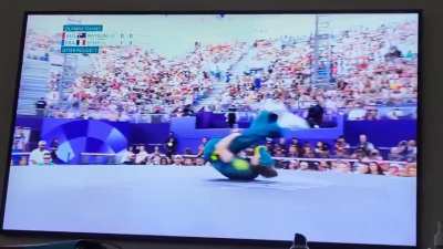 Dude watching Australias breaking performance at the 2024 Olympics in Paris