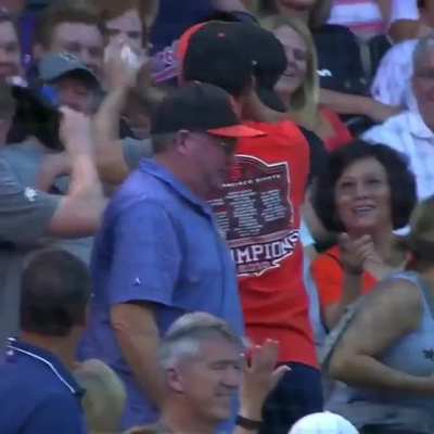 When you bring a giant glove to the game and still miss the foul ball