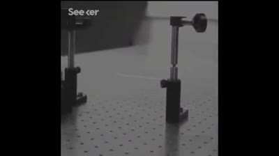 Light was caught moving in slow motion, using a camera with a shutter speed of about a trillionth of a second.
