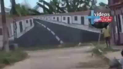 Car crashes into a wall painted like it was road ahead (Sorry for low quality)