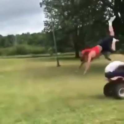 Attempting to jump over a moving ATV