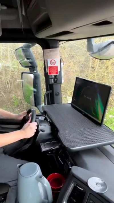 Truck driver takes a break from work