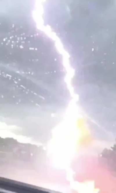 Lightning striking two cars caught on