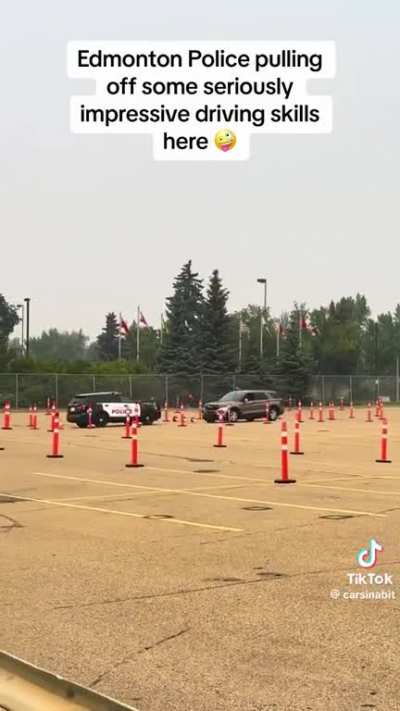 This police officer's ability to drive in reverse is impressive!