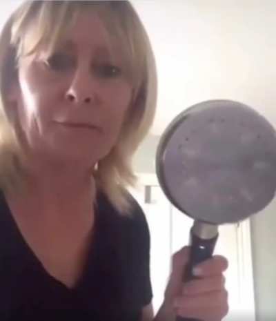 Mom shows off new cooking pot
