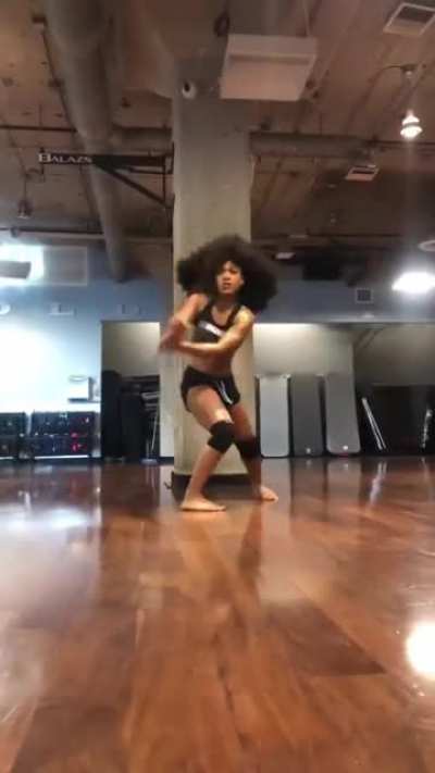 Woman showing off her staff bonking skills
