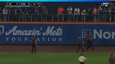 [Highlight] [Highlight] A fan is escorted off the field after falling over the railing in the outfield seats.