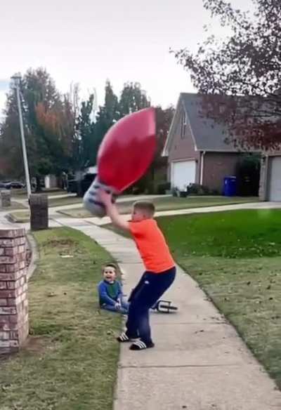 kids falls over after throwing a balloon ?