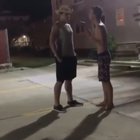The shirtless guys reaction when grey shirt absolutely eats the first punch
