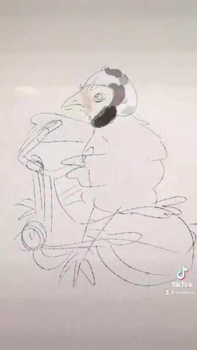 A baby chick on a bike ?
