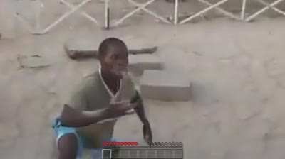African man having an unusual dish