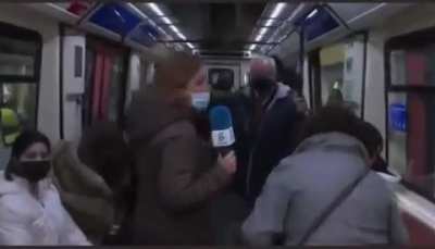 Recording a news segment in a Metro train car.