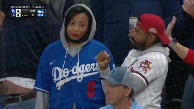 [Highlight] Braves fan with a low key fist bump in front of his SO