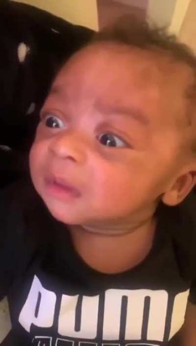 Baby watches himself crying...