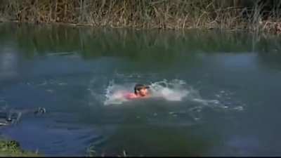 John Wayne swimming lesson