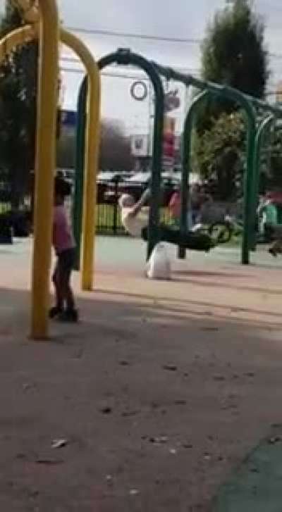 Just an old man on a swing set