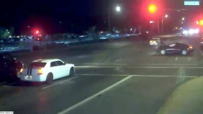 Car crash saves family crossing the street.