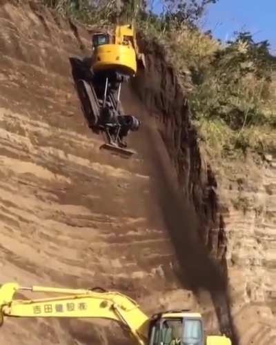 Excavator defies gravity.