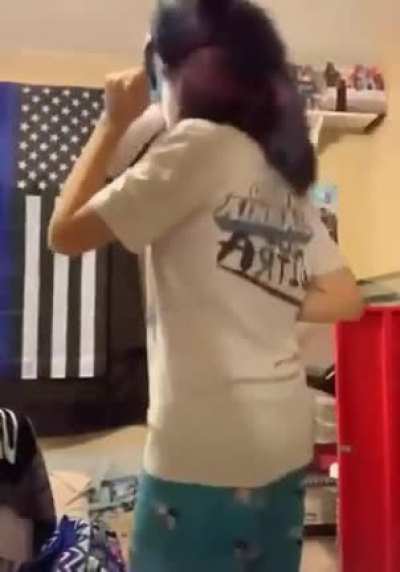 Furry dancing in front of a blue lives matter flag to anime music