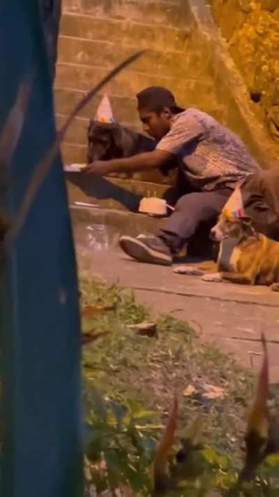Man celebrates b-day and shares cake with best buddies