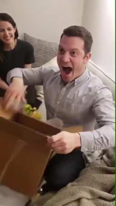 Wife gifting N64. His reaction is priceless