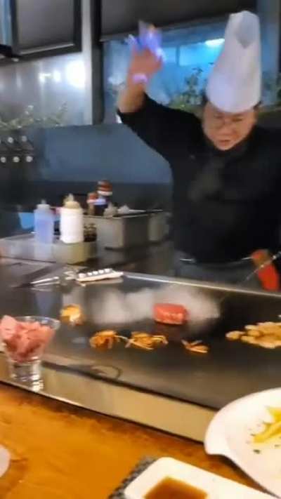 This chef's flambéing technique.