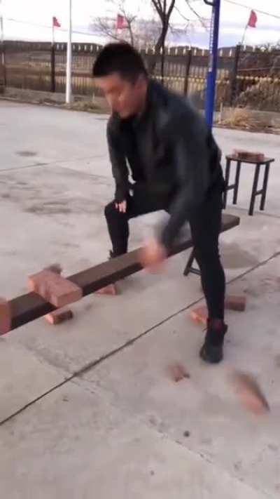 This guy smashing bricks