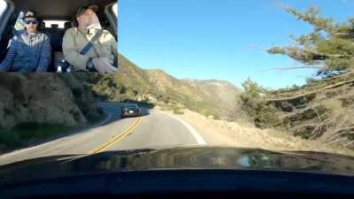 Idiot cuts double yellow turn and almost kills someone in classic car.