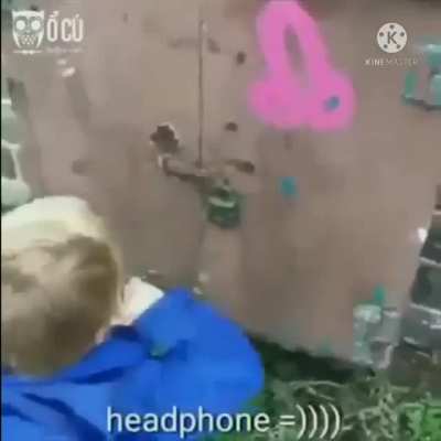 A kid sees a wild graffiti