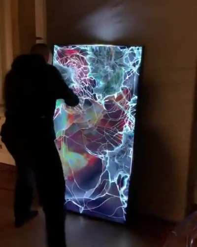 Beating the shit out of a TV makes for surprisingly trippy visuals