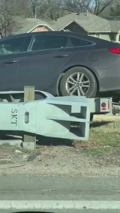 The idiot recording almost caused an accident too
