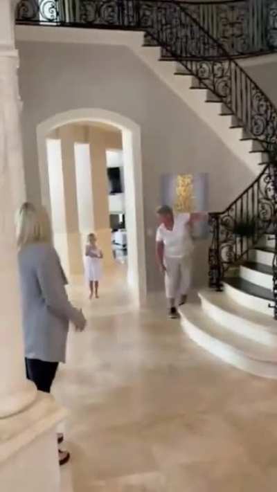 Grandparents come to see the new baby for the first time.