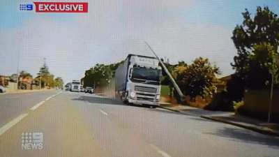 Out of control truck crashes through intersection, poles, bus shelter and fences before finally stopping with no injuries Adelaide, Australia 28 Feb 2023
