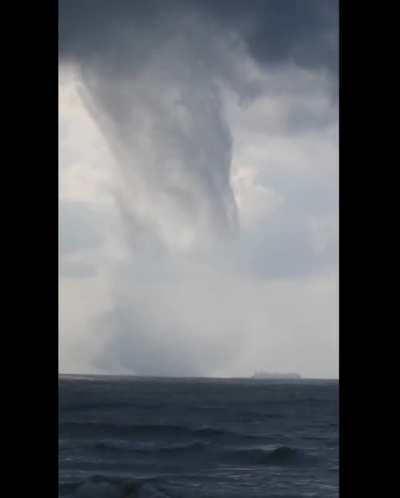 ? Man Captures Massive Multiple-Vortex Waterspout