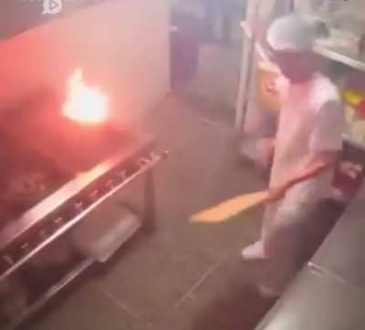 Trying to turn off oil fire with water