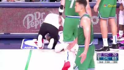 [Highlight] Tyrese Haliburton goes down injured after he trips over a defender's feet.