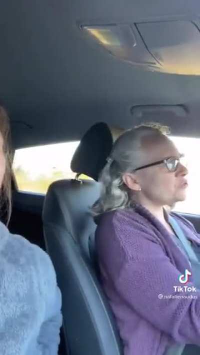 Two audio book narrators in the car