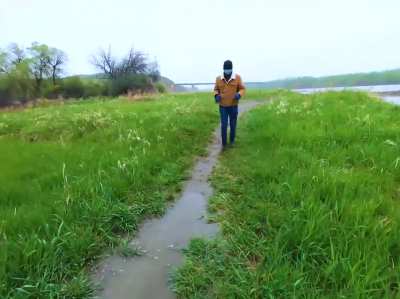 Me and my brother leading each other on a blindfolded hiking trip