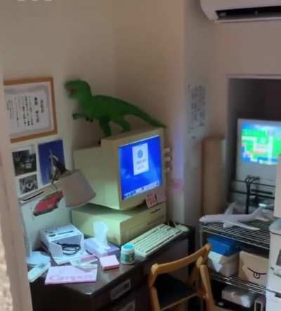 Somebody made an entire miniature room in a power outlet
