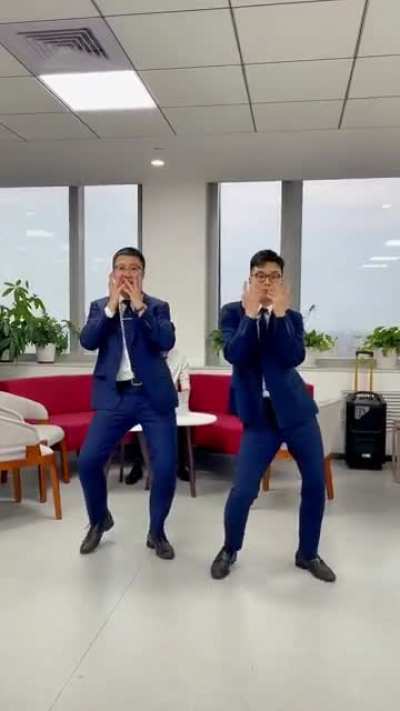 I am thinking what is the behind guy doing so seriously ?