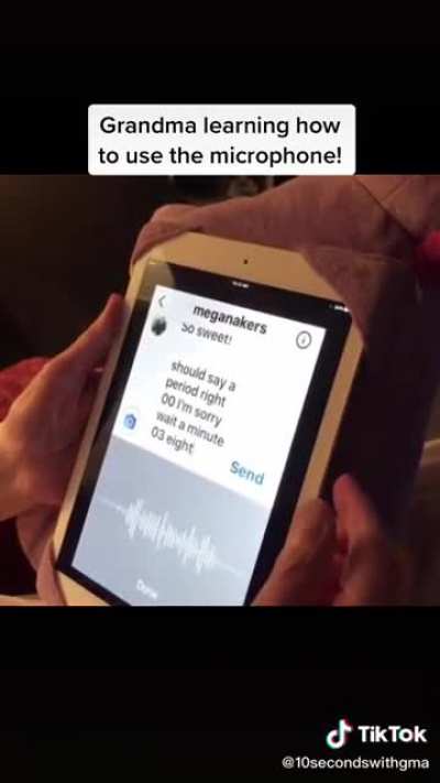 Grandma learning how to use the microphone!