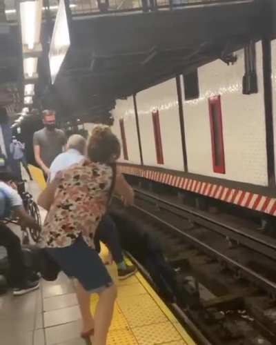 A HERO Just seconds before the train arrived, a good Samaritan jumped onto the tracks to save a man in a wheelchair.